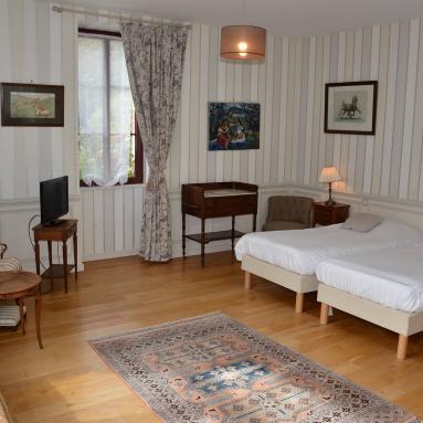 Lit de la chambre d'hôtes 