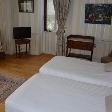 Lit de la chambre d'hôtes 